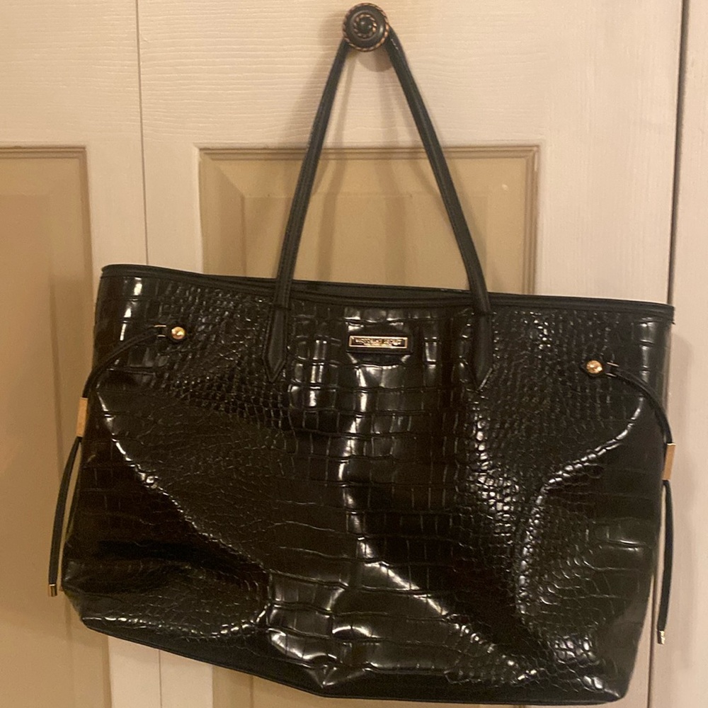Victoria’s Secret tote bag.